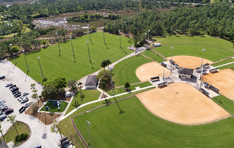 Aerial view of baseball diamonds and athletic fields in The Acreage